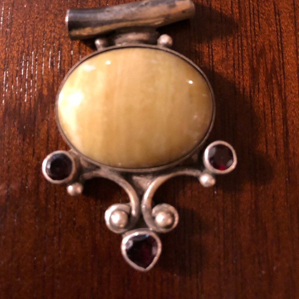 Authentic gemstone and sterling silver pendant
